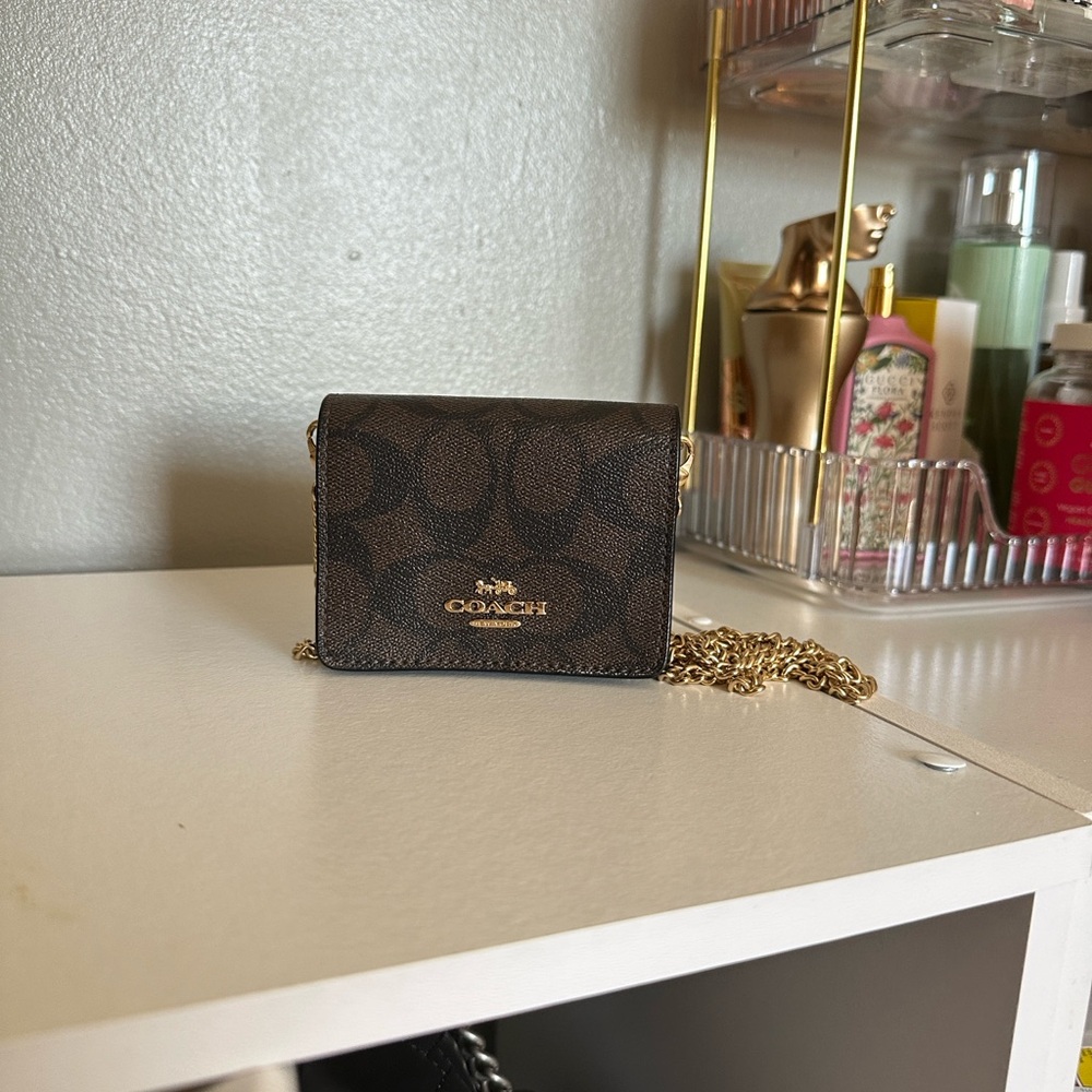 Coach mini wallet on a chain
